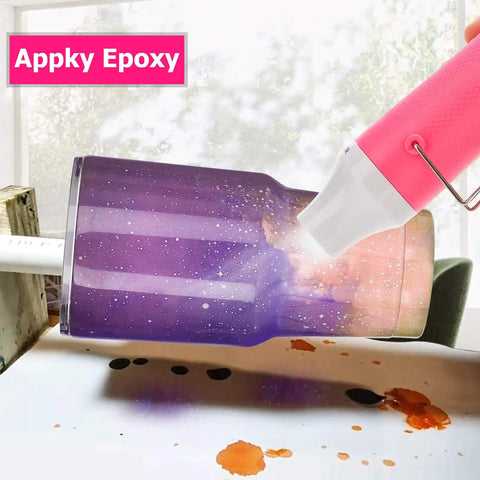 Compact Mini Heat Gun For Resin And Craft Projects That Quickly Bubbles Away Epoxy Silicone Molds Embossing And Acrylic Pouring Bubble Removal Small Art Projects Pink Color Fast Warm Up And Portable Drying Tool used on a purple resin tumbler