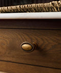 Antique brass cabinet knob on wood drawer, close-up, part of 10 Pack Antique Brass Cabinet Knobs And Vintage Drawer Pulls For Kitchen Cabinets Dressers And Cupboards, Zinc Alloy Hardware With Durable Electroplated Finish, Corrosion Resistant, Easy Installation.