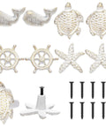 Coastal Nautical Cabinet Knobs Eight Piece Set With Starfish Sea Turtle Rudder Whale Pulls And Handles in White Gold Finish