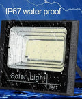 JUDYSSY 800W Solar Floodlight Outdoor Spotlight IP66 Waterproof with Remote Control on display with IP67 water proof label.