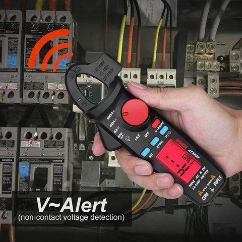 Hand holding Mini Clamp Meter For AC And DC Current Up To 100 Amp, Auto Range Digital Multimeter with Frequency Tester, front view