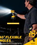 Man using Cordless LED Work Light With Beefy 1000 Lumen Beam, Compatible With 20V MAX Batteries, handheld flashlight outdoor