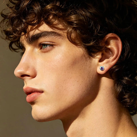 Profile view of a young man wearing Premium 5A Cubic Zirconia Screw Back Stud Earrings For Men And Women Hypoallergenic Surgical Steel.