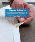 Close-up of adhesive strip being applied to PinchNot 90 Degree Door Pinch Guard for Kid Safe Living, Baby Proofing Hinge Protector.