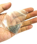 Hand holding a bag of M2 X 5mm Set Screws Stainless Steel 304 Hex Socket Allen Head With 0.9mm Allen Wrench Included 100 Pcs