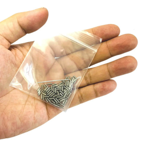 Hand holding a bag of M2 X 5mm Set Screws Stainless Steel 304 Hex Socket Allen Head With 0.9mm Allen Wrench Included 100 Pcs