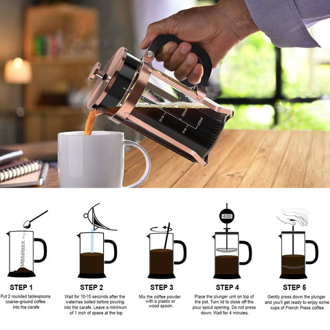 Person pouring coffee with Stainless Steel French Press Coffee Maker With Borosilicate Glass Carafe Copper Finish 21 Ounce
