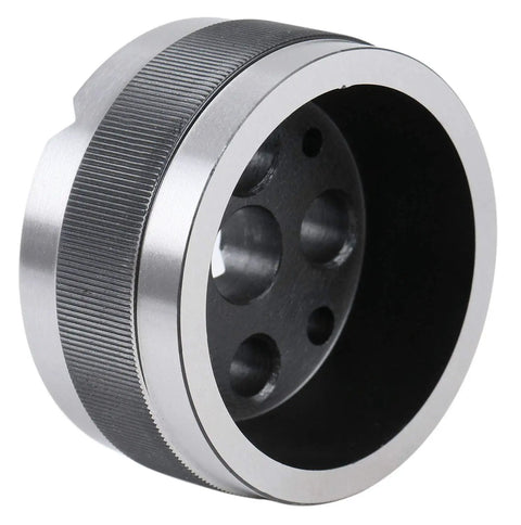Machinist Bench Block 3 Inch Diameter 1.5 Inch Height Hardened Ground Steel With 1/8 to 5/8 Inch Holes Knurled Edge For Secure Grip V Groove Across Face For Round Stock Pin Driving And Drilling, angled view