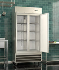 Built Tough Two Door Reach In Commercial Freezer 27 6 Cubic Feet Stainless Steel Kitchen Workhorse with doors open showing shelves.
