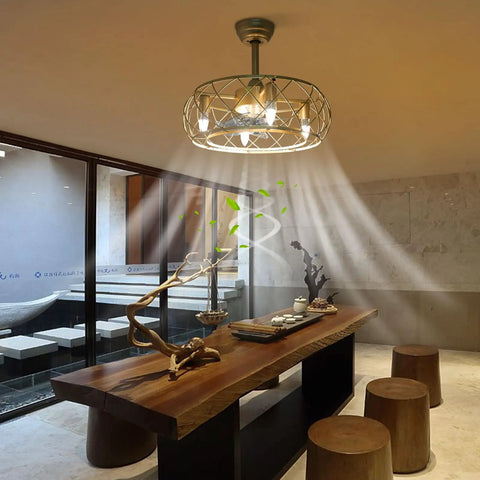 Caged Ceiling Fan with Light Wireless Control Gold Iron for Bedroom hanging above a wooden dining table in a modern room.