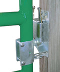 Straight Up Heavy Duty Two Way Livestock Gate Latch Three Pack installed on a green gate, showcasing rust resistant clasp design.