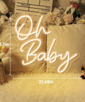 Oh Baby Warm White LED Neon Sign For Home Decor And Party Vibes great for bachelorette parties, placed on soft pillows with flowers.