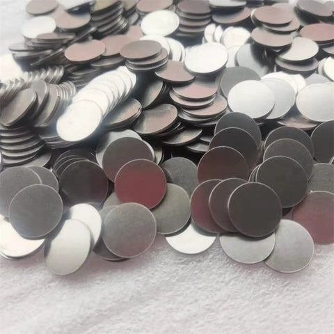 316 Stainless Steel Spacer For CR2032 Coin Cell Battery 15.8 X 1 mm Flat Gasket 1000 Pack scattered on white surface