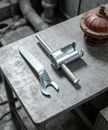 Heavy Duty Pro Fire Sprinkler Head Removal Wrench Two Piece Kit Steel Installation Tool For Concealed And Standard Commercial Jobs With Thread Cap And No Hassle Grips on a metal surface.