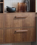 Walnut Wood Drawer Pulls Set Six Pack 5.04 Inch Length With Rounded Edge for cabinets and dressers, mounted on wood cabinets.