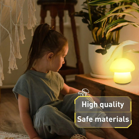 Child sitting near Rechargeable Mushroom Night Light With Tap And Remote Control Cordless Multicolor LED Nightlight glowing softly