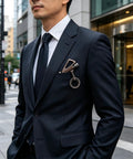 Man in suit with Infinity Forever Match Lighter With Multitool Keychain Bottle Opener for Outdoor Survival clipped to pocket