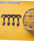 Heavy Duty Wall Mounted Power Tool Holder With Rock Solid Steel Garage Storage Rack For Drills And Hand Tools showing four drills on a yellow wall.