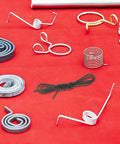 Top Grade Manganese Steel Mechanical Extension Spring Wire Kit With High Elasticity And Adjustable Tension For Industrial Power Transmission Plus Pottery Heating Coils That Rock. black coil spring wire kit on red background