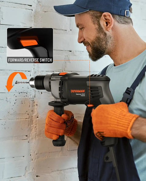 Man using Beefy 7.5 Amp Corded Hammer Drill With 1/2 Inch Metal Chuck, Variable Speed From 0 To 3000 RPM on concrete wall