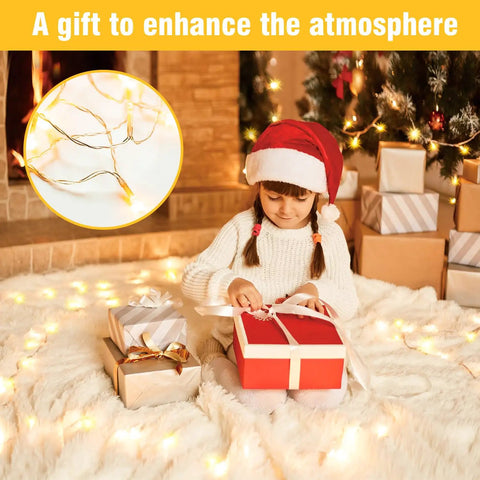 Girl with gifts surrounded by Warm White LED String Lights 70 Ft Waterproof and Connectable for Indoor and Outdoor Holiday Decor