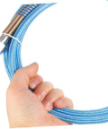 Hand holding a blue High Temperature PTFE Steam Hose For Irons And Steam Cleaners Lightweight And Easy Install Replacement Flexible Durable Hose With Wide Fittings For Steam Ironing And Cleaning showing wide fittings.