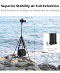 60 Inch Carbon Fiber Tripod For Cameras Ultralight Travel Buddy in beach setting with weight for stability and sea view.