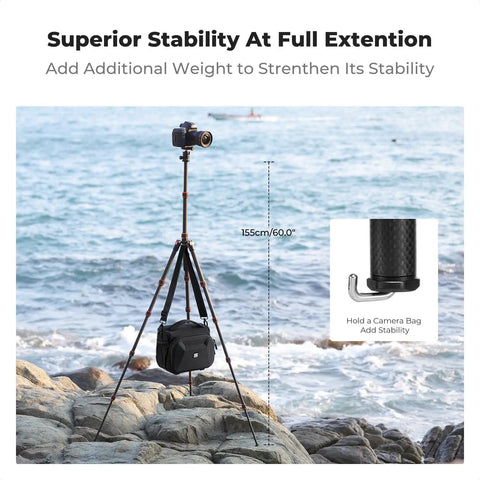 60 Inch Carbon Fiber Tripod For Cameras Ultralight Travel Buddy in beach setting with weight for stability and sea view.