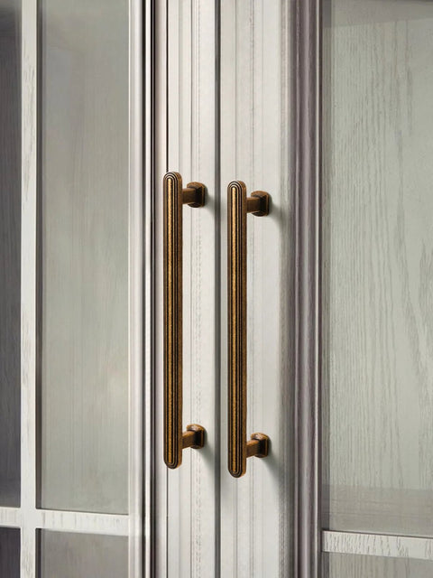 10 Pack Antique Brass Cabinet Pulls 3 Inch 76mm for kitchen cabinets installed on white wooden doors