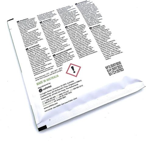 Back of Restore Espresso Machine Descaler Organic Cleaning Powder packet showing instructions and safety warnings.
