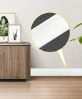 Super Easy Install Flexible Vinyl Baseboard Trim Molding Five Inches Wide And Forty Feet Long Cove Base With One Inch Crease Waterproof Tough Durable White Color For Your Walls shown installed in a living room.