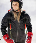 Skier wearing red Army Leather Heli Ski Glove For Freeride Skiing And Mountaineering, Classic 3 Finger Snow Mitt In Red, Size 7.