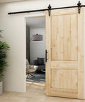Sliding Barn Door Pull Handle Set With Flush Hardware In Rustic Black Powder Coat Finish installed on wooden door