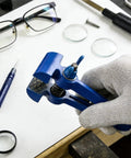 Heavy Duty Handheld Vise Pliers 50mm Mini Bench Clamp For DIY And Home Use, Cast Iron Body With Carbon Steel Jaws held in gloved hand.