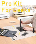 Person using Electric Screwdriver Kit With 64 Magnetic Bits And 12 Precision Tools for phone repair on a desk mat
