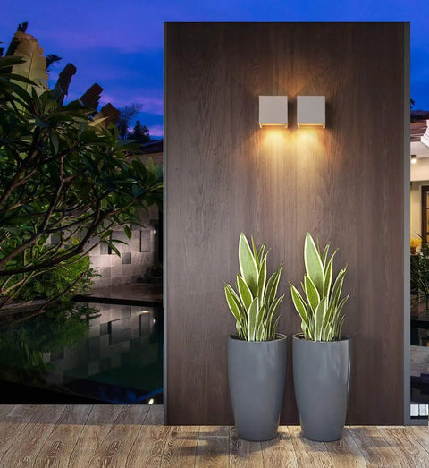 Two 6000K LED Cube Wall Light 4.7 Inch Exterior Die Cast Aluminum IP65 Waterproof Slick Sconce, 20W on wooden panel wall.