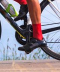 Cyclist using 4 Pack Black Pedal Straps For Fixed Gear Bikes, Adjustable Foot Rest Strips on outdoor ride
