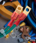 Close-up of 25 Pack Solderless Quick Disconnect Adapters Non Insulated Wire Connectors One Quarter Inch Male Tab Number Ten Stud