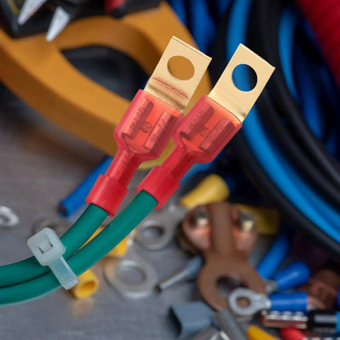 Close-up of 25 Pack Solderless Quick Disconnect Adapters Non Insulated Wire Connectors One Quarter Inch Male Tab Number Ten Stud