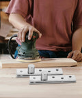 Craftsman sanding wood near two pack stainless steel stealth hidden door hinges 360 degree pivot concealed door hinge for wooden doors