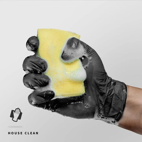 Heavy Duty Black Nitrile Gloves 4 Mil Large 100 Count Powder Free Latex Free Food Safe holding a soapy sponge for cleaning.