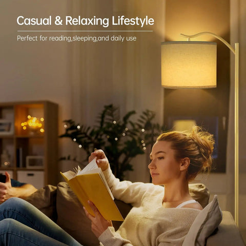 Woman reading under Arched LED Floor Lamp With Linen Shade And Double Layer Lampshade, Tall Modern Standing Light With E26 Socket