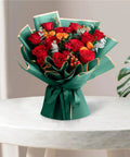 Deep Green Bouquet Wrapping Paper With Gold Edge 60 Count Pro Grade Floral Wrap for flower shops on a bouquet with red roses.