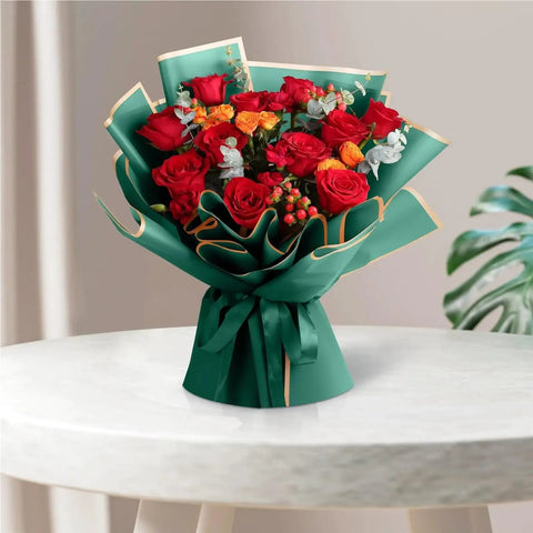 Deep Green Bouquet Wrapping Paper With Gold Edge 60 Count Pro Grade Floral Wrap for flower shops on a bouquet with red roses.