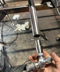 3/8 Inch Heim Joint Rod End Kit With Jam Nut And Bung Chromoly Panhard Kit Right And Left Hand Thread Zinc Coated, held in hand