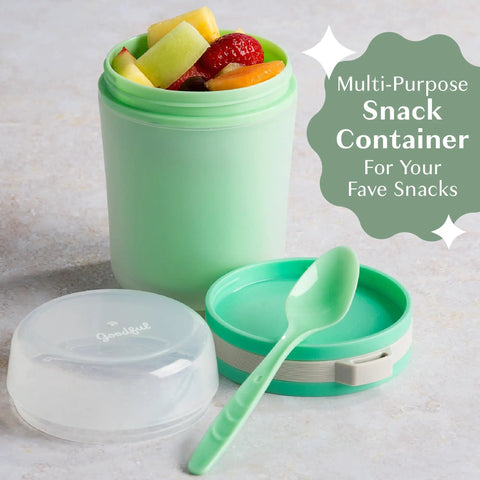 Double Wall Insulated Yogurt Container With Spill Proof For Real Lid Green Snack Cup Holding A Reusable Spoon Microwave Safe Dishwasher Approved Freezer Ready 14 Ounce Grab And Go Food Storage For Lunch with fruit inside.