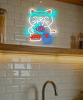 Lit Sushi Cat Neon Light Sign With White LED For Kitchen Or Home Bar Party Decor With Bright Glow Ramen Shop Vibe Cute Cat Lover Gift For Foodies And Cat Fans featuring a playful cat design on white tile background.