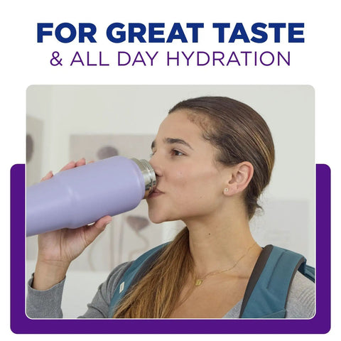 Woman drinking from a purple water bottle, promoting great taste and all-day hydration benefits.
