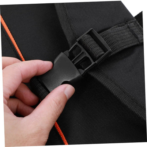 Person securing the black flat out rugged oxford drum pouch waterproof percussion storage case buckle strap.