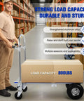 Heavy Duty Two In One Folding Hand Truck Dolly Cart Boasting A Legit Eight Hundred Pound Weight Limit with a box in a warehouse.